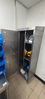 an image of a metal locker with blue bins