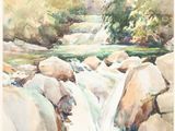 watercolor painting of a stream with rocks and trees in the background