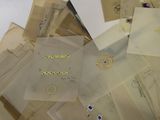 a pile of old letters and envelopes on a table