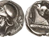 an ancient coin with a horse and a man on it