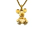 une image représentant un collier en or orné d'un cochon