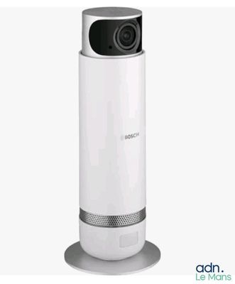 an image of a camera that is sitting on top of a stand