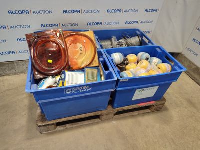 two blue bins with food in them sitting on a pallet