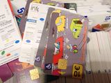 a pile of cards that are sitting on a table