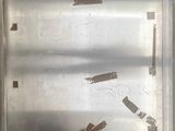 a picture of a piece of metal that has been taped up