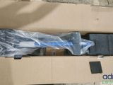 a cardboard box with a blue toothbrush inside of it