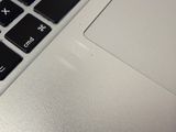 a close up view of a laptop keyboard with a calculator on it