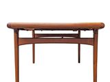 an image of a wooden coffee table with a drawer underneath it