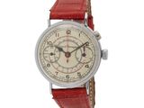 an image of a wrist watch with a red leather strap