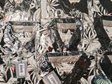 a lot of black and white items on the wall