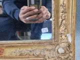 a man that is taking a picture of himself in a mirror