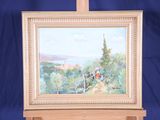 a picture of a painting on a easel with a blue background