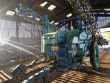 a tractor that is parked inside of a building
