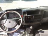 a picture of a car dashboard with a steering wheel