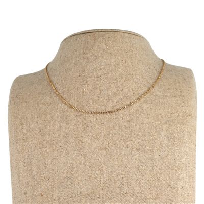 a gold chain necklace on a mannequin mannequin mannequin mannequin mannequin mannequin mannequin mannequin manne