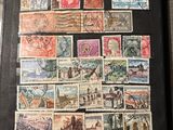 a book with a bunch of stamps on it
