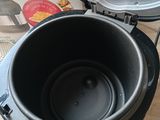 a close up of an air fryer sitting on a table