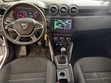 a picture of a dashboard of a car with a steering control