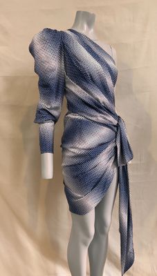 a mannequin wearing a blue and white dress on a mannequin mannequin