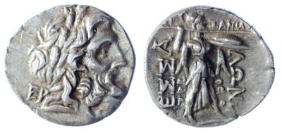 a silver coin with an image of a woman and a man on it
