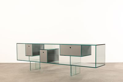 an image of a glass table with two drawers on top of it