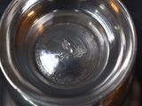 a close up view of a glass of water on a table