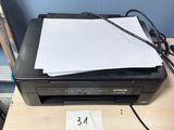 a printer that is sitting on top of a desk
