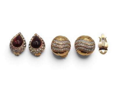 three pairs of earrings and a ring with diamonds