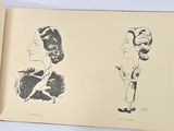 an open book with a drawing of a man and a woman on it
