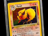 a close up of a pokemon card in a plastic holder