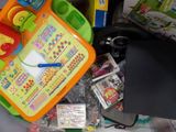 a pile of children ' s toys and toys on a table