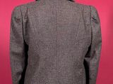 the back view of a grey jacket on a mannequin mannequin mannequin mannequin mannequin mannequin mannequin manne