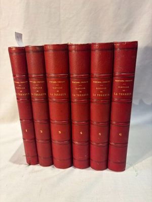 a set of five red books sitting on top of each other