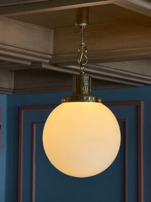 a light that is hanging from the ceiling in the room