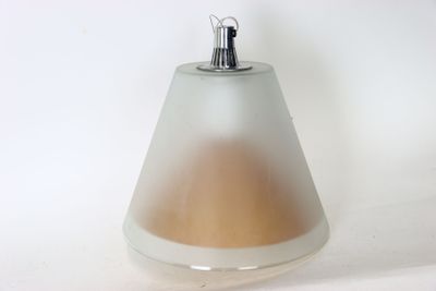 a lamp that is sitting on a white surface