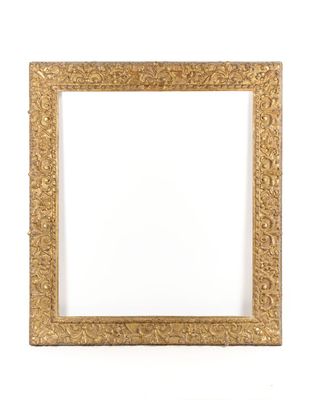 an antique gold frame with a white background