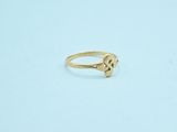 a gold ring with a paw print on it