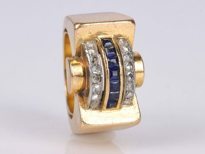 Bague Tank en or et platine centrée d'une ligne de saphirs calibrés en - Photo 1