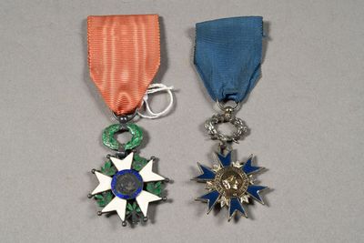 two medals that have been placed next to each other