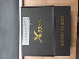 a black box with a gold logo on it and a black box with a gold logo on it