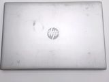 an image of a laptop computer sitting on top of a white table