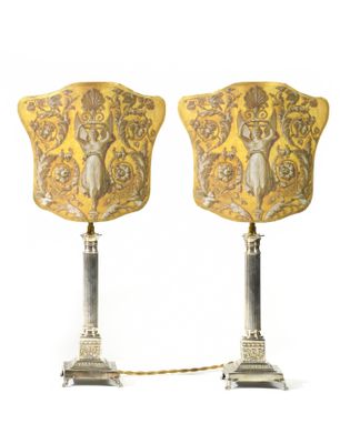pair of art nouveau style lamps in the manner of person