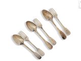 four forks and two spoons sitting next to each other on a white surface