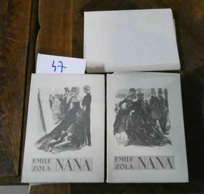 Deux livres sont posés sur une table, avec un mot devant eux.