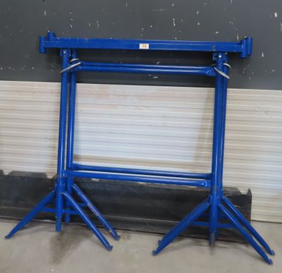 a pair of blue steel stands in a garage