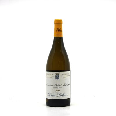 a bottle of wine that is sitting on a table