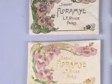 three different types of perfume labels on a white surface
