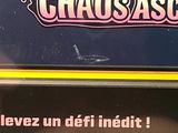 a sign on the back of a car that says chaos ascend