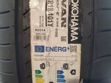 a close up of a car tire with a sticker on it