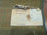 a piece of paper that has been left on the floor
